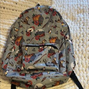 Loungefly Harry Potter Backpack Grey with Red and Brown Accents.